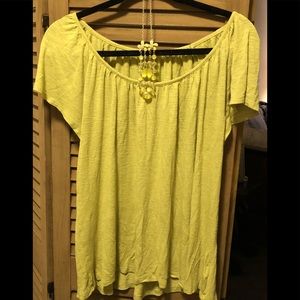 Very vibrant lime green blouse.